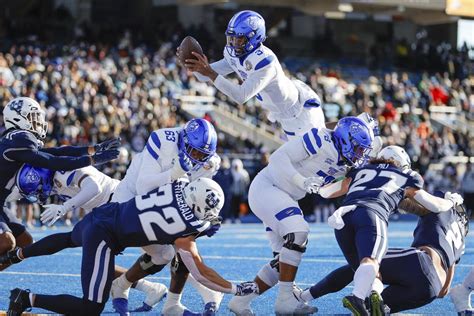 Darren Grainger throws for 3 TDs, runs for 2 as Georgia State rolls past Utah State in Potato Bowl